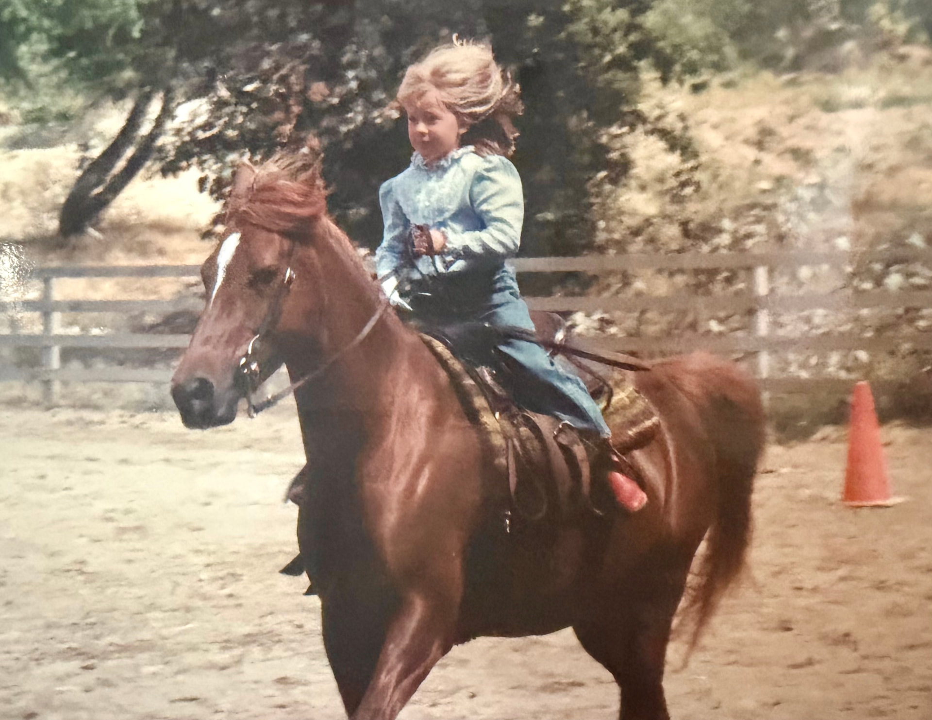 Personal photo from Leah's childhood farm years in Deary, Idaho, featuring horses or farm life.
